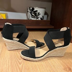 Wedged 2.5 inch strapy heels with jute detailing. Size 8, black.